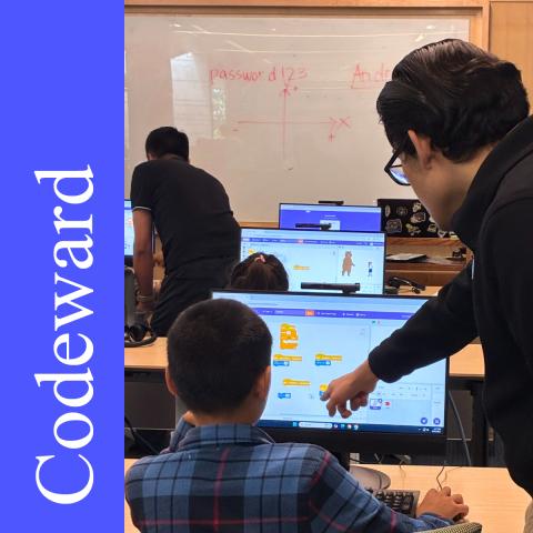Tutor helping student code
