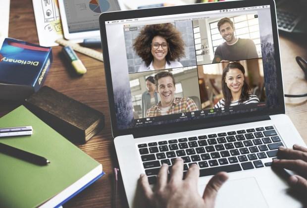 A laptop computer showing English Conversation Circle happening on Zoom 