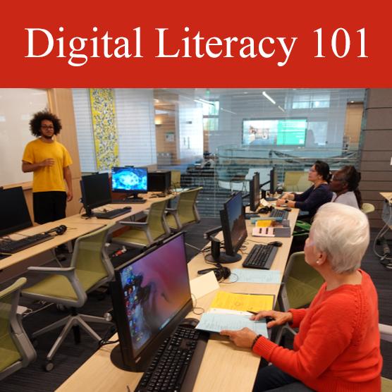 picture of learner and instructor in computer classroom