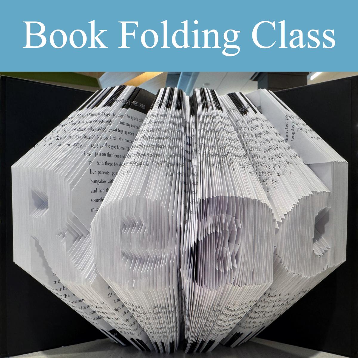 image of book with pages folded so they display the word "read"