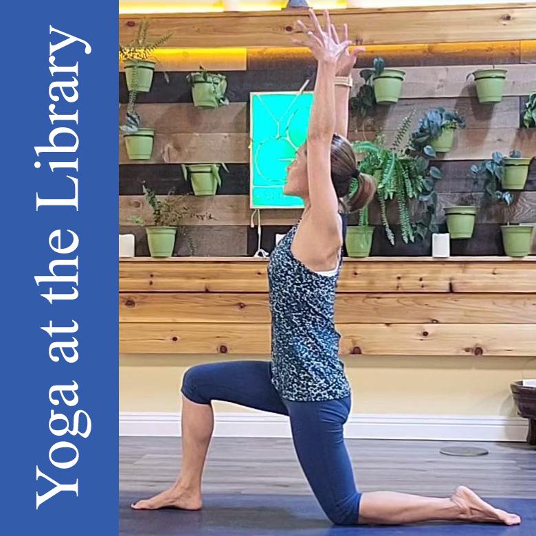 Yoga instructor Iva Chu reaches up to demonstrate a pose